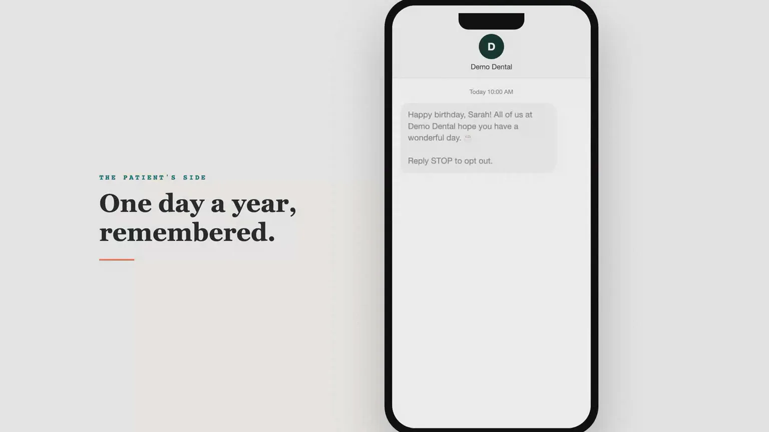 Phone showing a birthday greeting text a patient receives from the clinic