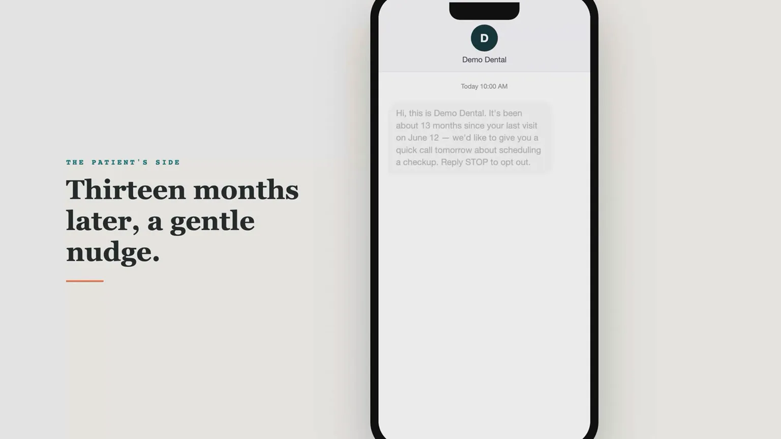 Phone showing the recall text message a lapsed patient receives from the clinic